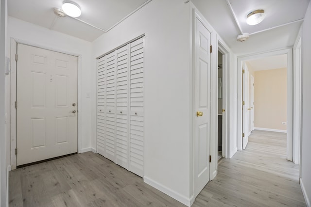 hall featuring light wood-type flooring