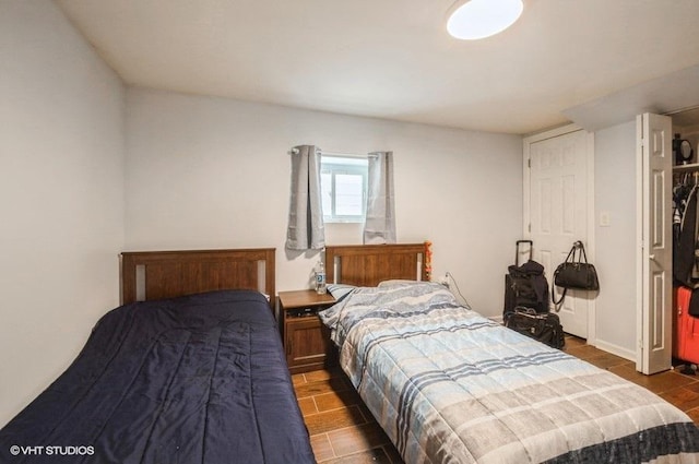 bedroom featuring dark hardwood / wood-style floors