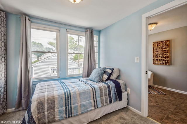 bedroom featuring carpet