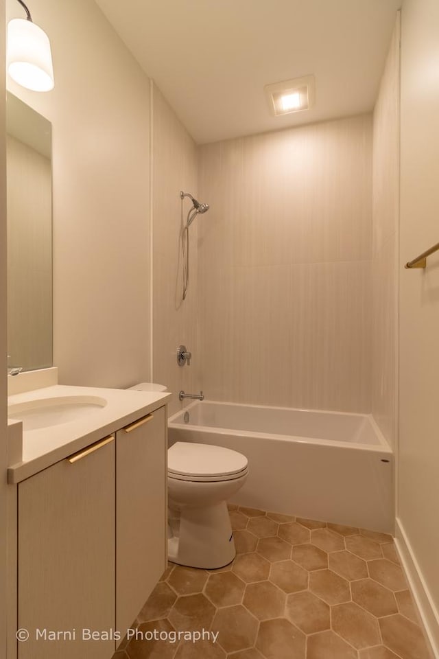 6517 S Saint Lawrence Ave, Chicago, IL 60637 - bathroom with tile patterned floors, toilet, shower / bathtub combination, and vanity