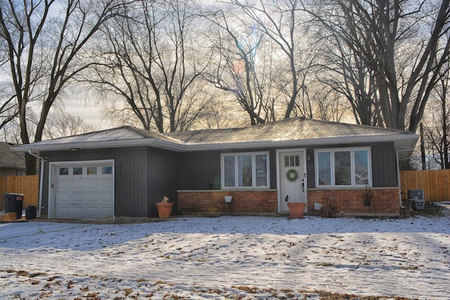 single story home featuring a garage