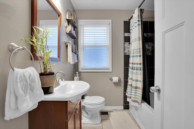 full bathroom with shower / tub combo with curtain, vanity, toilet, and tile patterned flooring