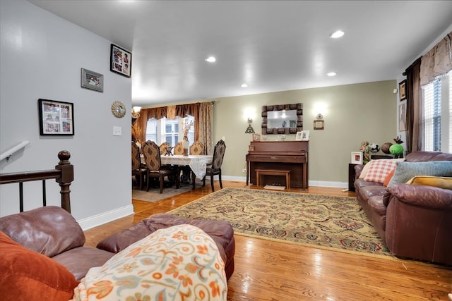 living room featuring light hardwood / wood-style flooring and plenty of natural light