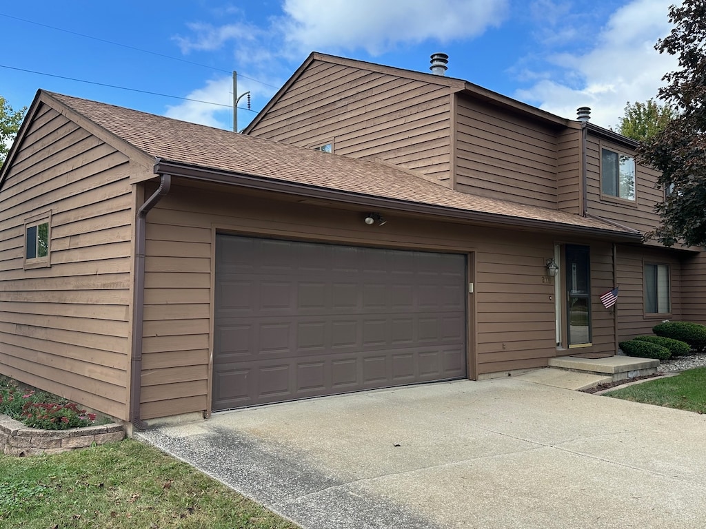 exterior space featuring a garage