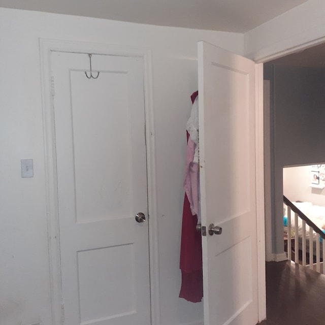 hallway featuring hardwood / wood-style floors