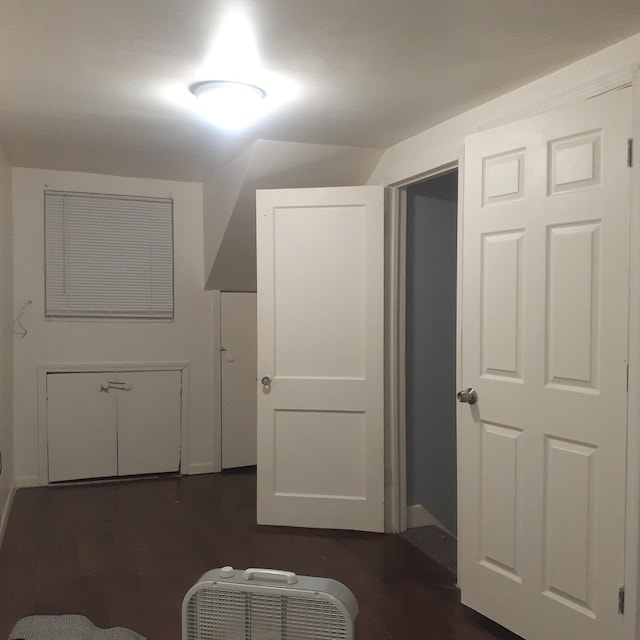 bonus room featuring dark hardwood / wood-style floors