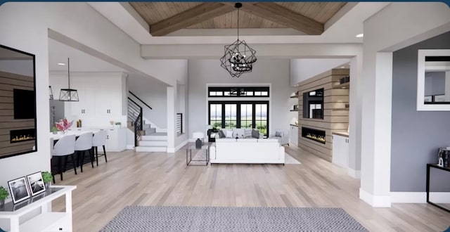 entrance foyer featuring beam ceiling, a chandelier, wooden ceiling, and a fireplace