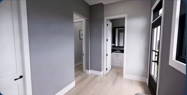 hallway with light wood-type flooring