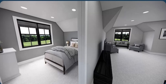 bedroom featuring vaulted ceiling and carpet floors