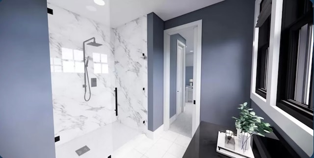 bathroom with a tile shower