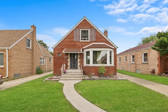 view of front of home with a front lawn