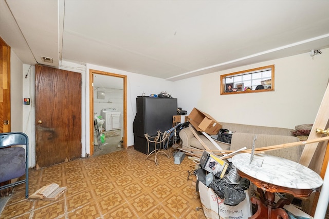 interior space with washing machine and clothes dryer