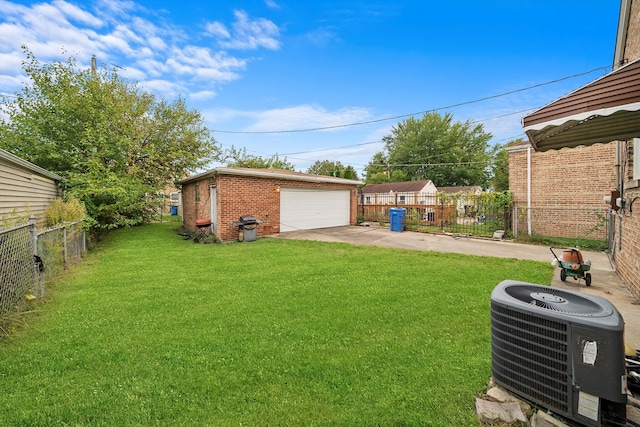 view of yard with central AC unit, an outdoor structure, and a garage