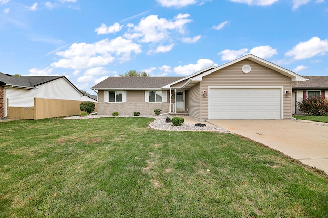 ranch-style house with a garage and a front lawn