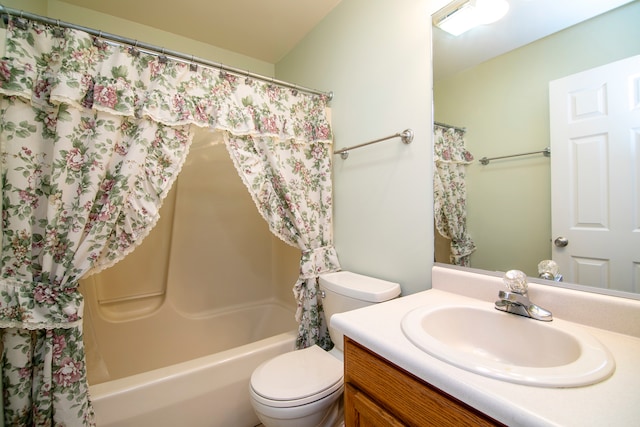 full bathroom with shower / bath combination with curtain, vanity, and toilet