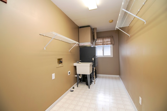 clothes washing area with hookup for a washing machine and electric dryer hookup