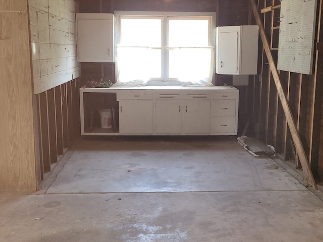 kitchen featuring white cabinets