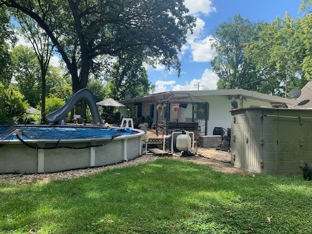 back of house with a yard