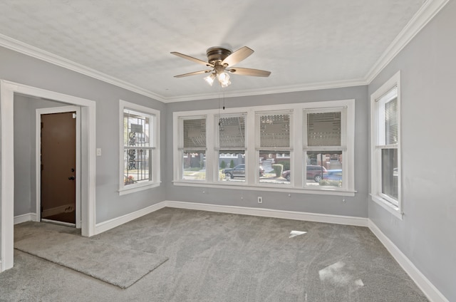 unfurnished sunroom with ceiling fan