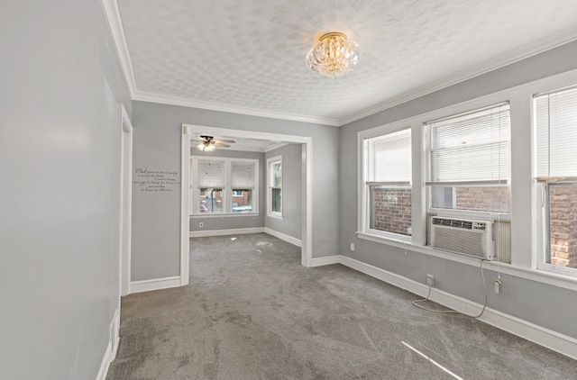 unfurnished room featuring ornamental molding, carpet, and plenty of natural light