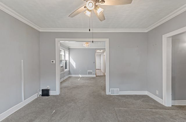 unfurnished room featuring light carpet, ceiling fan, and ornamental molding