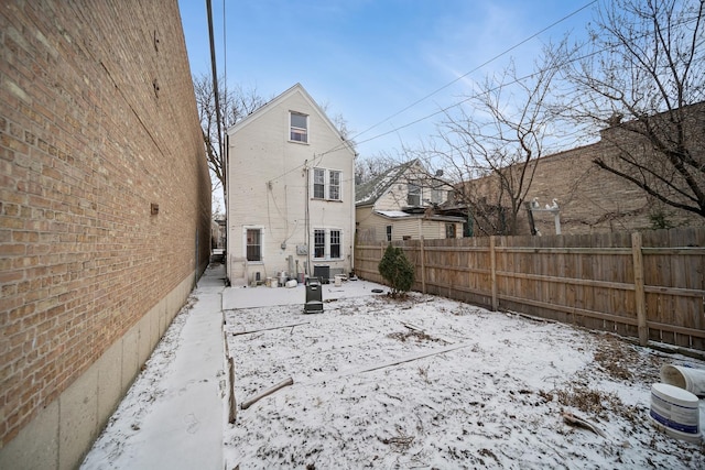 view of snow covered property