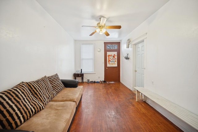 living room with hardwood / wood-style flooring and ceiling fan