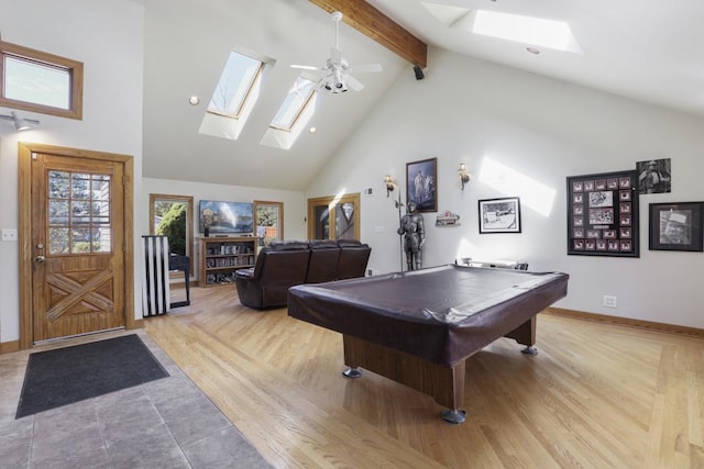 game room with a skylight, pool table, high vaulted ceiling, baseboards, and beamed ceiling