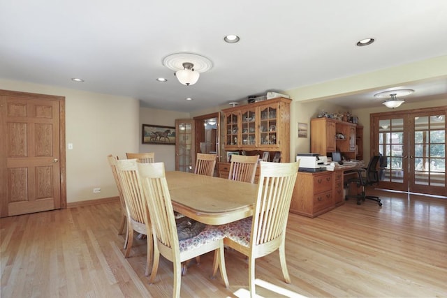 dining space featuring french doors, recessed lighting, light wood finished floors, and baseboards