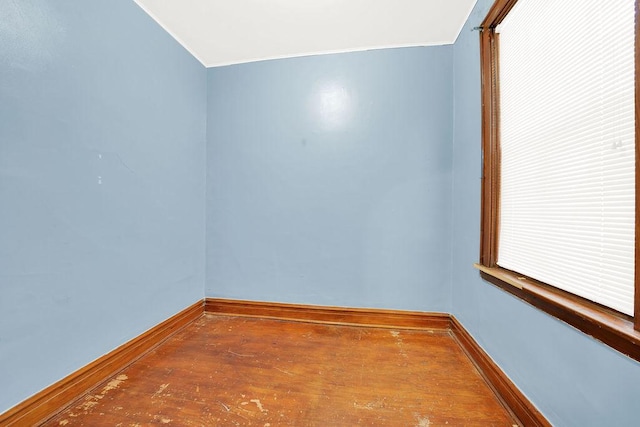 2333 W Huron St, Chicago, IL 60612 - unfurnished room featuring baseboards and wood-type flooring