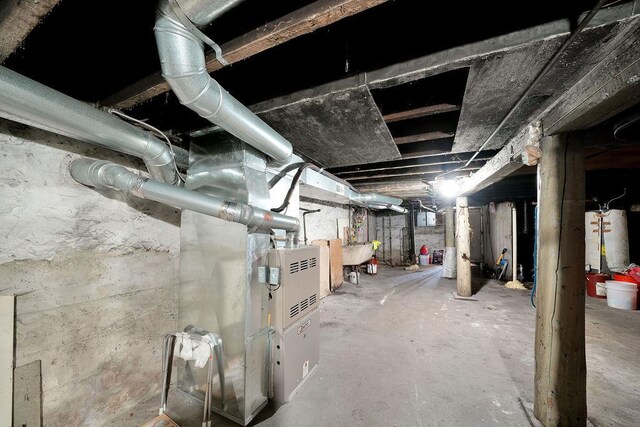 2333 W Huron St, Chicago, IL 60612 - unfinished basement with water heater and a sink