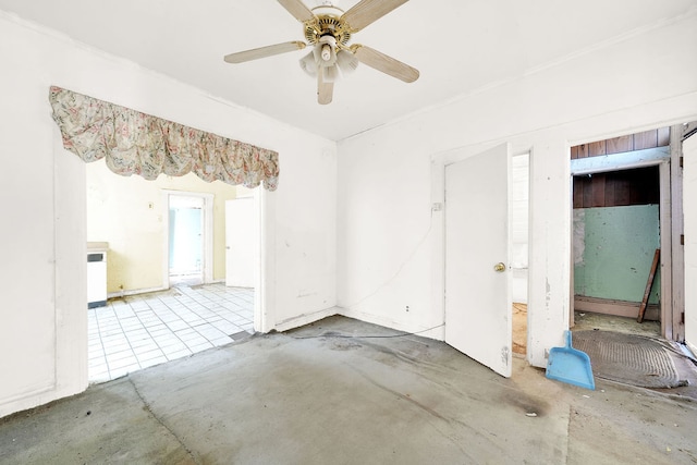 unfurnished room with ceiling fan