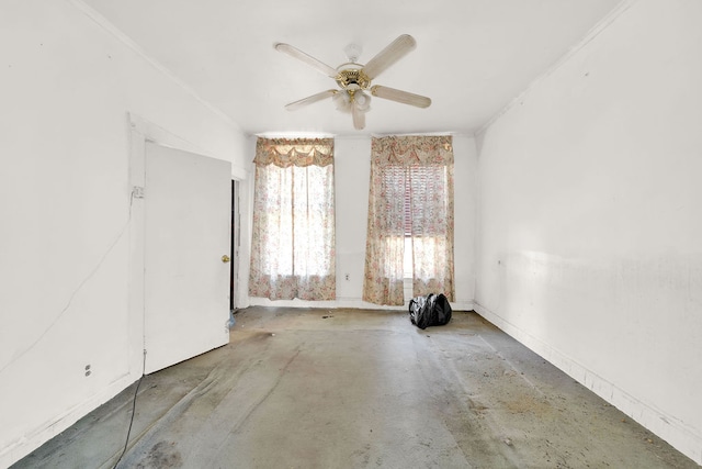 unfurnished room with crown molding and ceiling fan