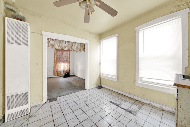 empty room featuring ceiling fan