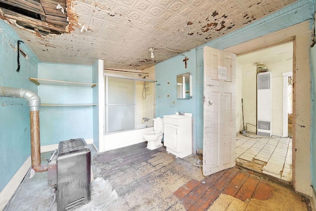 2333 W Huron St, Chicago, IL 60612 - full bathroom featuring vanity, wood-type flooring, toilet, an ornate ceiling, and enclosed tub / shower combo