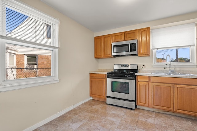 kitchen with appliances with stainless steel finishes and sink