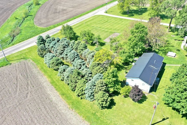 birds eye view of property with a rural view