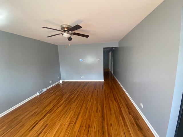 unfurnished room featuring ceiling fan and hardwood / wood-style floors