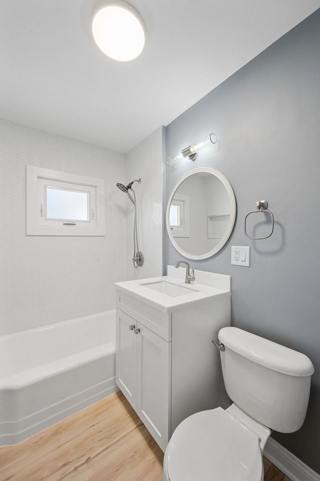 full bathroom featuring shower / bathtub combination, vanity, toilet, and hardwood / wood-style flooring