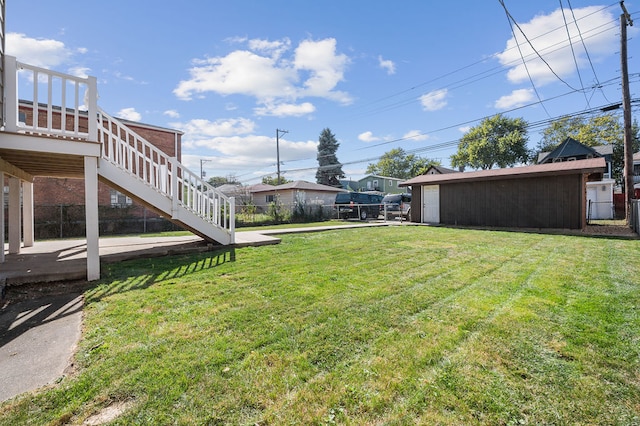 view of yard featuring a wooden deck