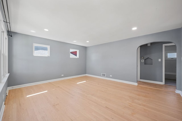 unfurnished room with light hardwood / wood-style flooring