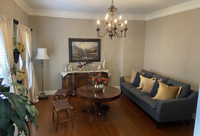 living room with dark hardwood / wood-style flooring, crown molding, and an inviting chandelier