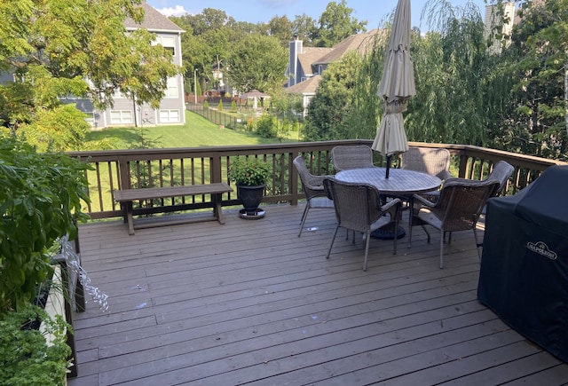 deck featuring a yard