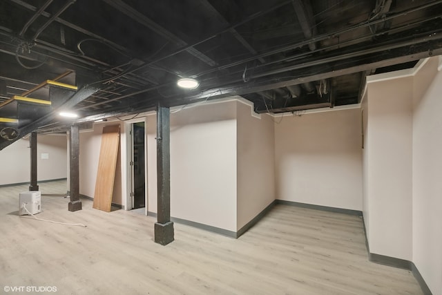 basement featuring light hardwood / wood-style flooring