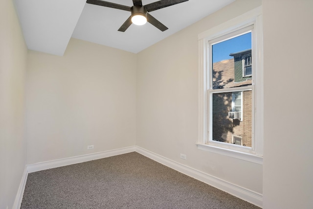 unfurnished room featuring carpet and ceiling fan