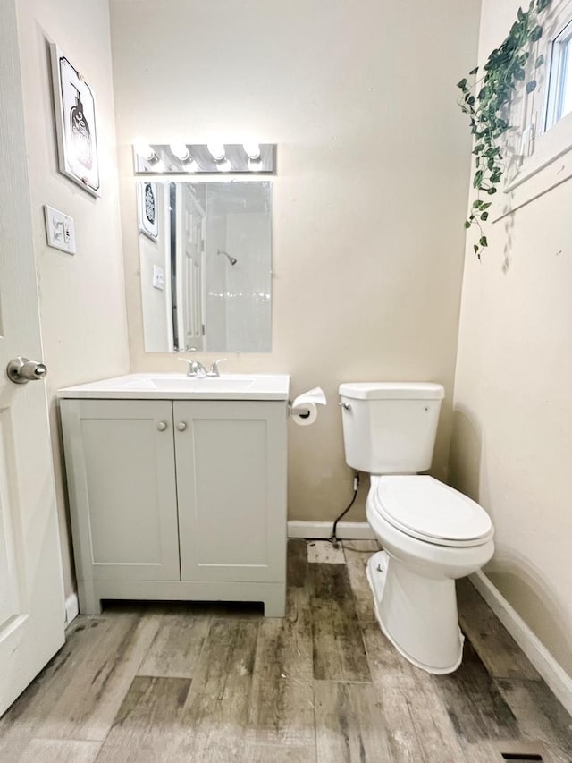 4764 S Shields Ave, Chicago, IL 60609 - bathroom featuring vanity and wood finished floors