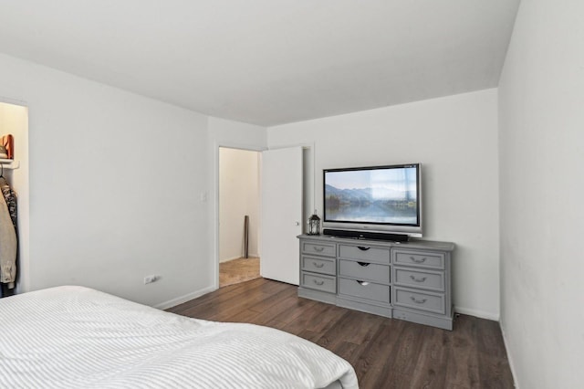 bedroom featuring dark wood-type flooring