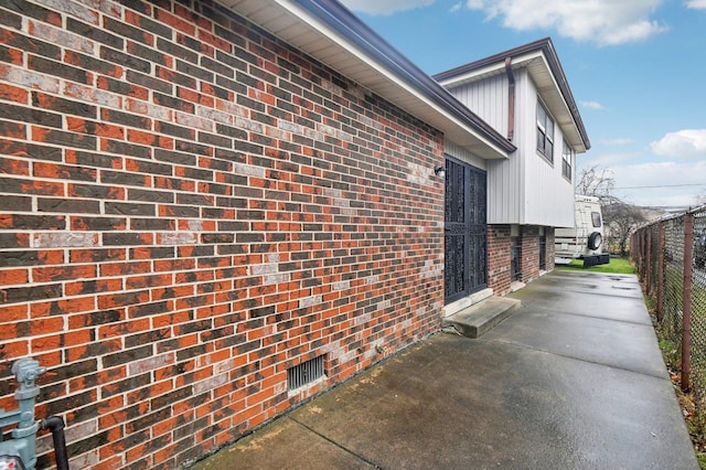 view of property exterior featuring a patio