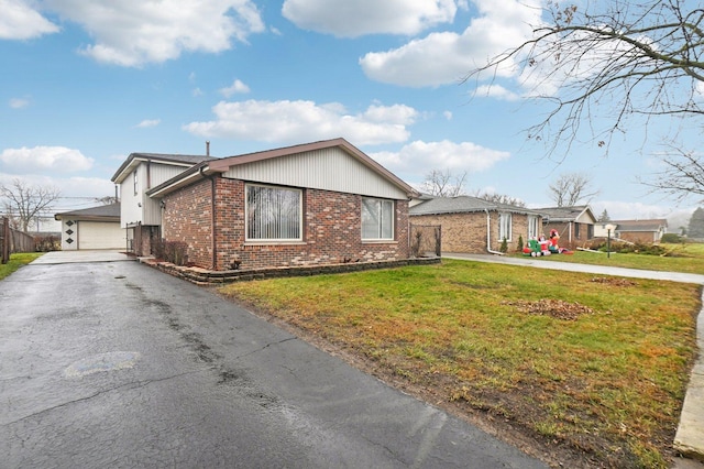 view of property exterior with a garage and a lawn