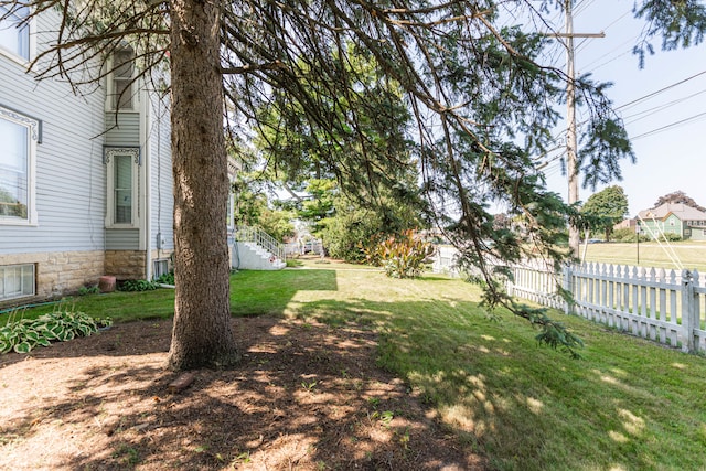 view of yard featuring central AC